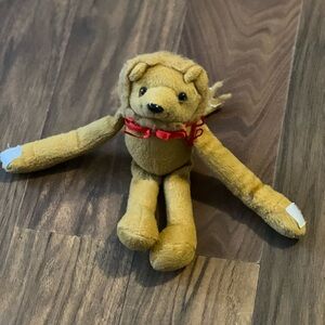 Plush Lion Toy with Red Bow